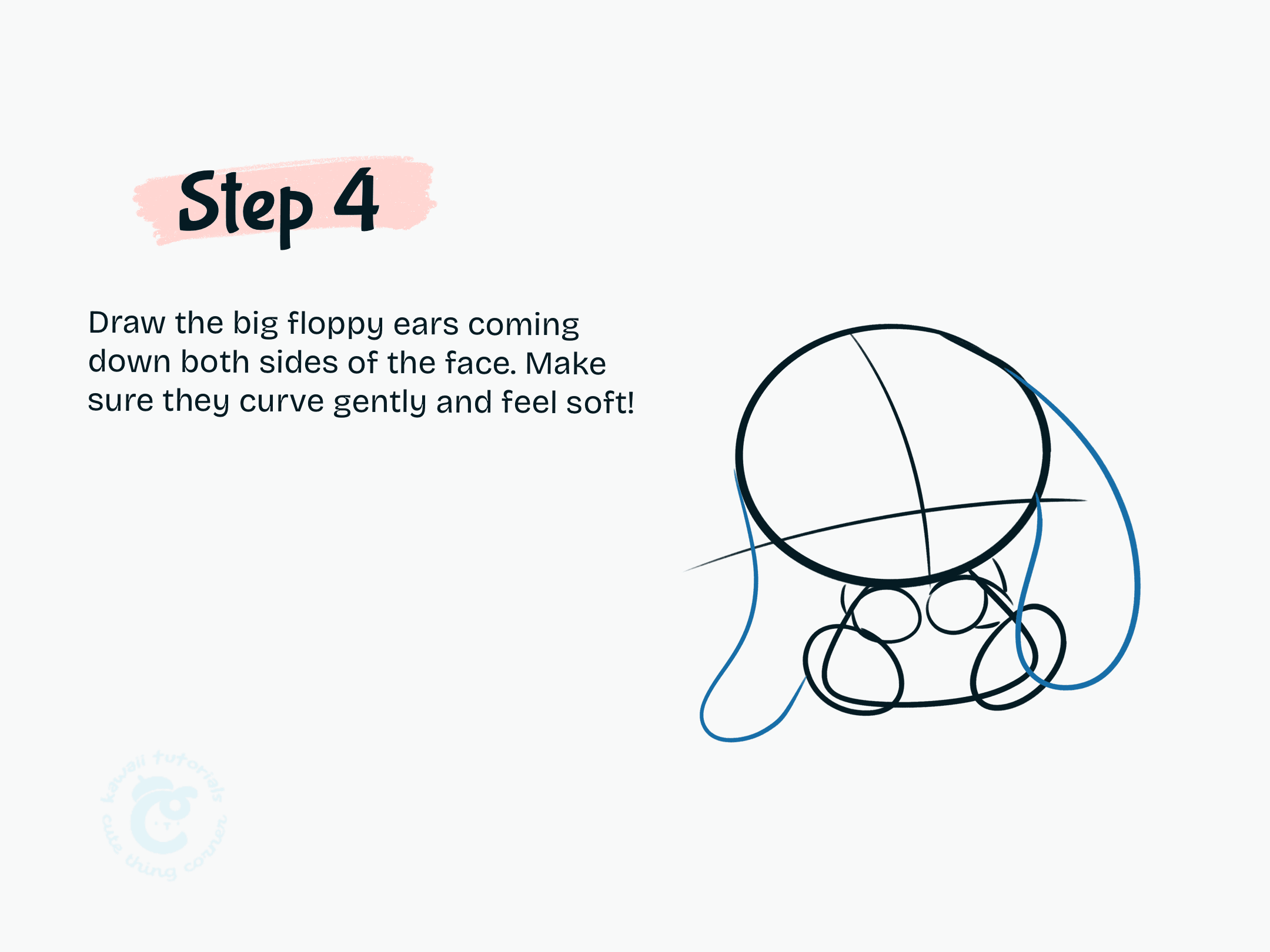 Draw the big floppy ears coming down both sides of the face.